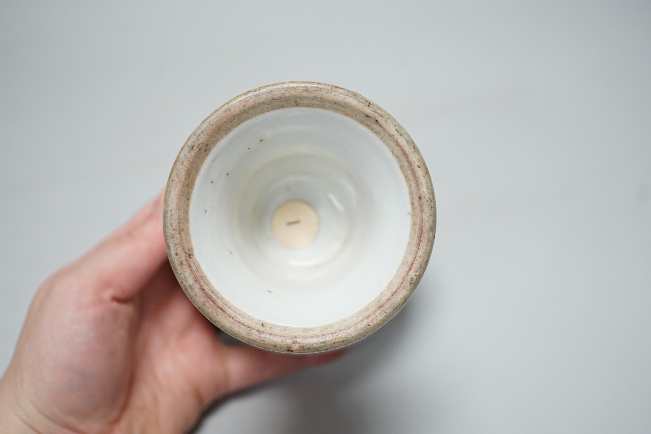 A 19th century Chinese stem cup, painted with flowers and fruit 12cm